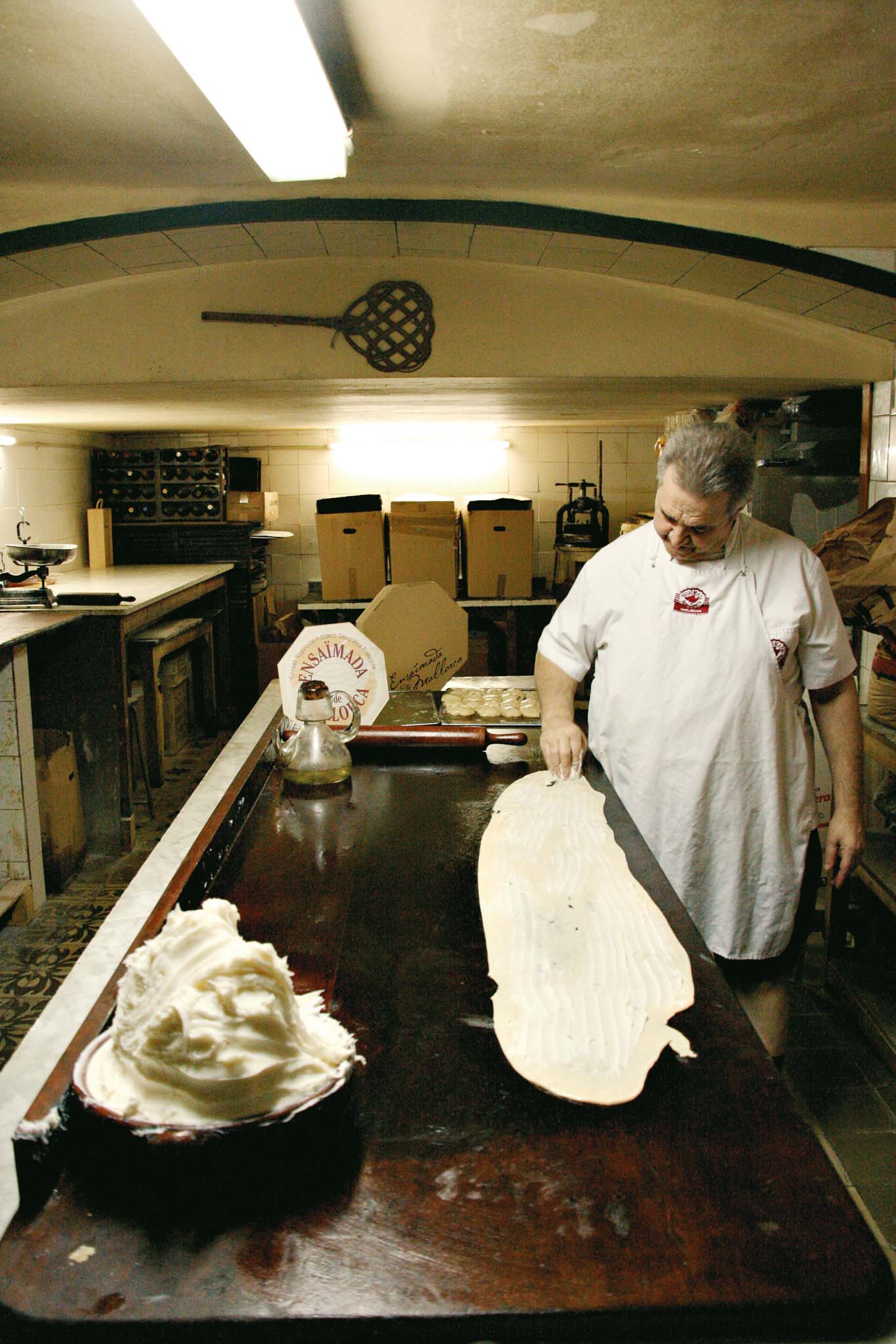 baker making ensaimadas