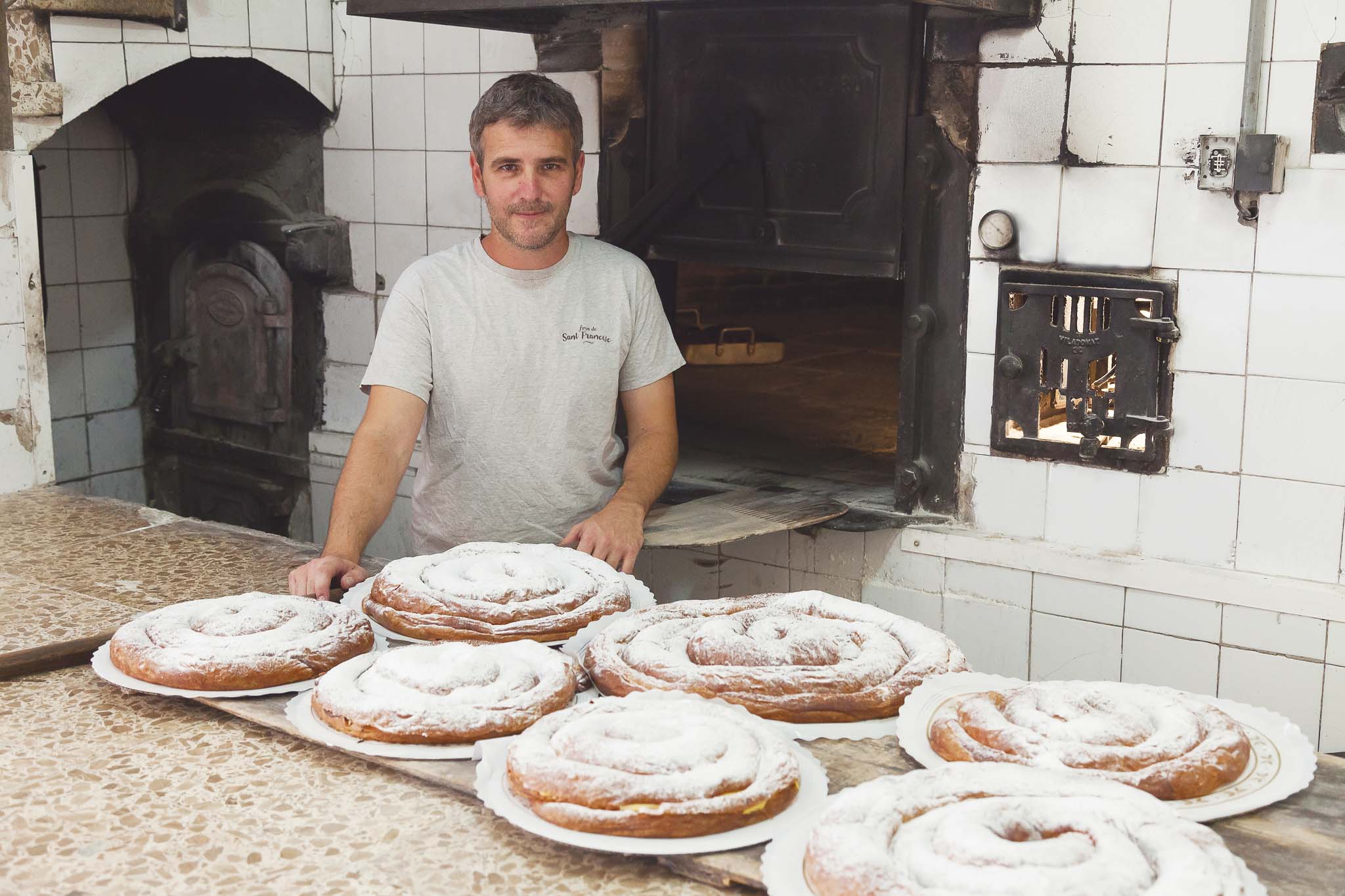 baker making ensaimadas