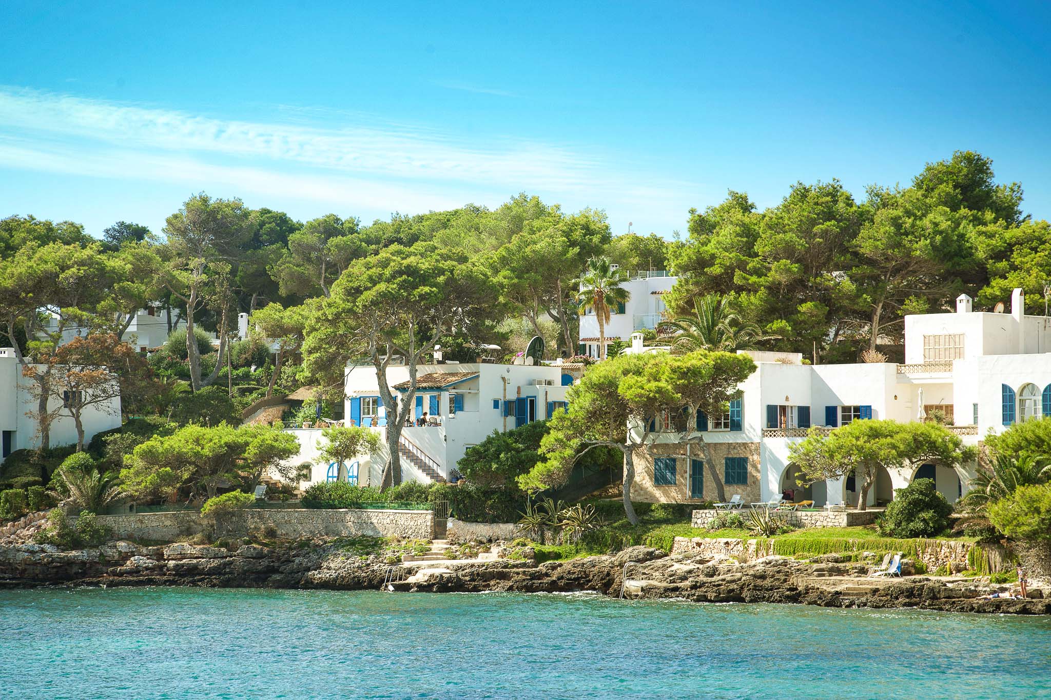 Cala d'Or coast with white houses and pine trees